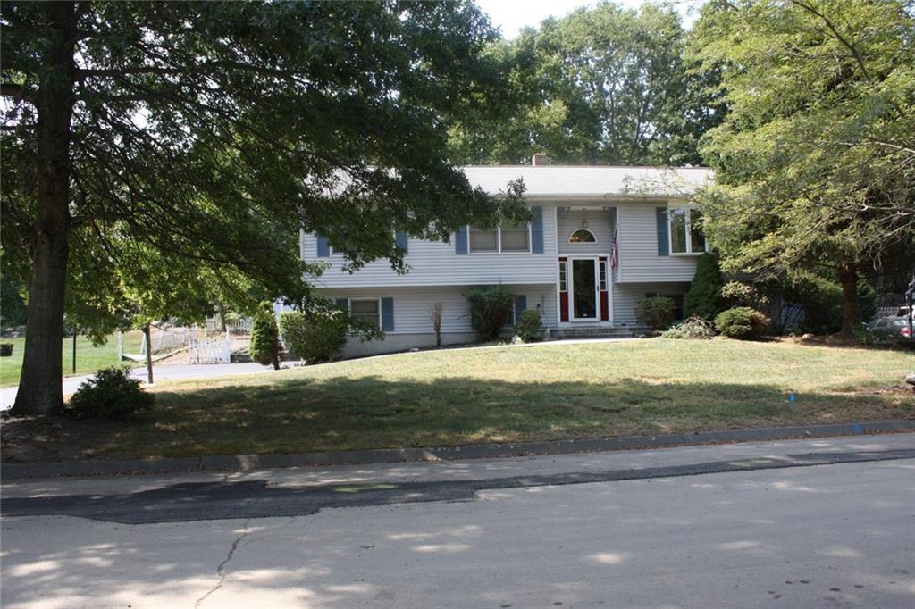 19 Menna Road Ansonia, CT 06401 - Photo 1 of 1 a front view of a house with a yard