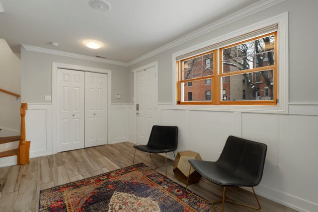 2651 West Rice Street Chicago, IL 60622 - Photo 11 of 20 a bedroom with a bed and wooden floor