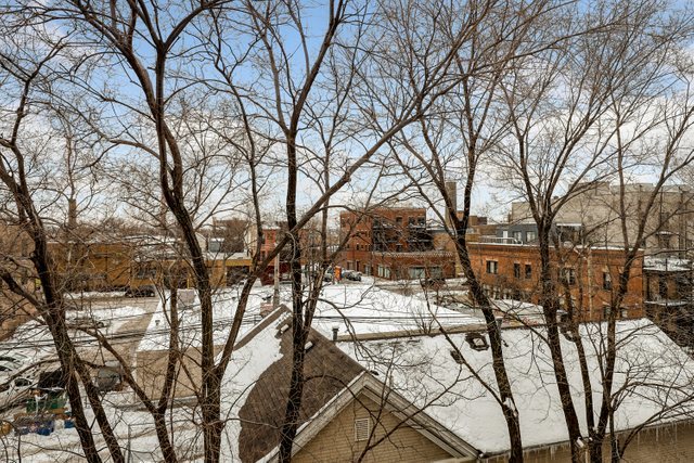 2651 West Rice Street Chicago, IL 60622 - Photo 19 of 20 a view of a yard with table and chairs