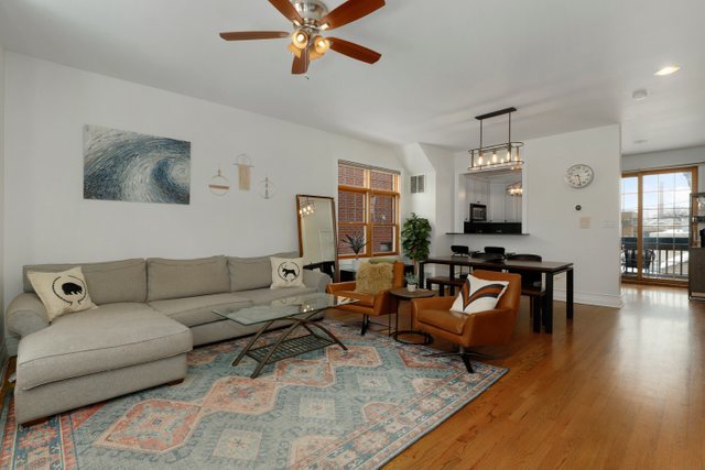 2651 West Rice Street Chicago, IL 60622 - Photo 3 of 20 a living room with furniture and wooden floor