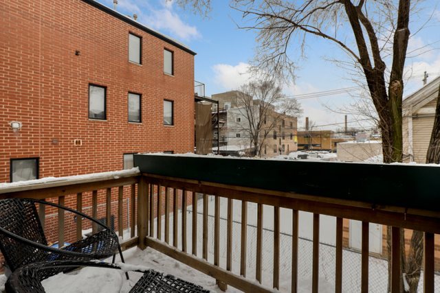 2651 West Rice Street Chicago, IL 60622 - Photo 8 of 20 a view of city from a balcony