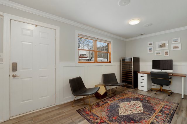 2651 West Rice Street Chicago, IL 60622 - Photo 10 of 20 a view of a livingroom with workspace and a window