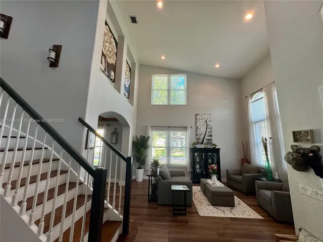a living room with furniture and window