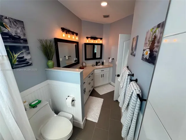 a room with lots of different colored cloths