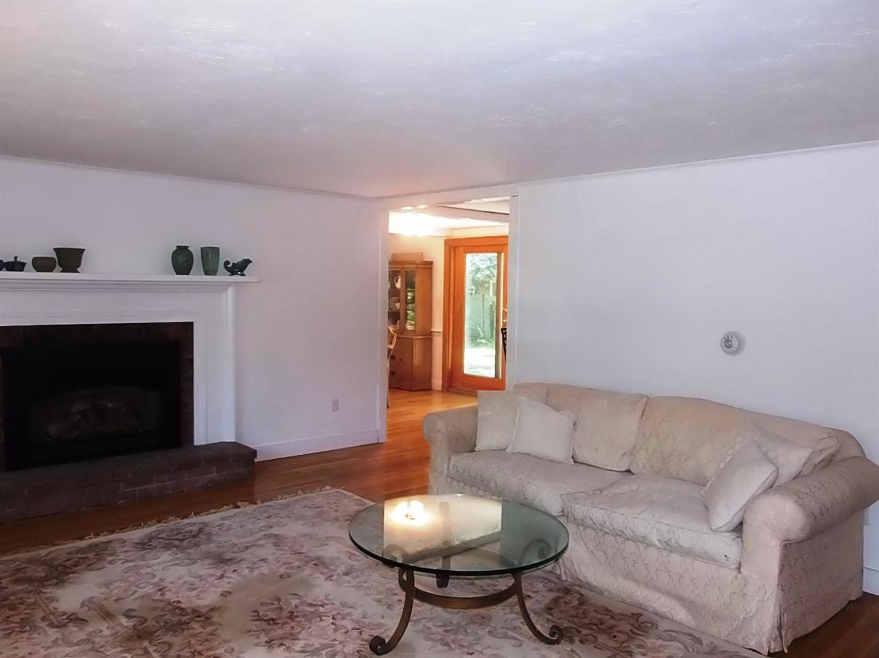 41 Edgewood Road Hyannis, MA 02601 - Photo 11 of 17 a living room with furniture and a fireplace