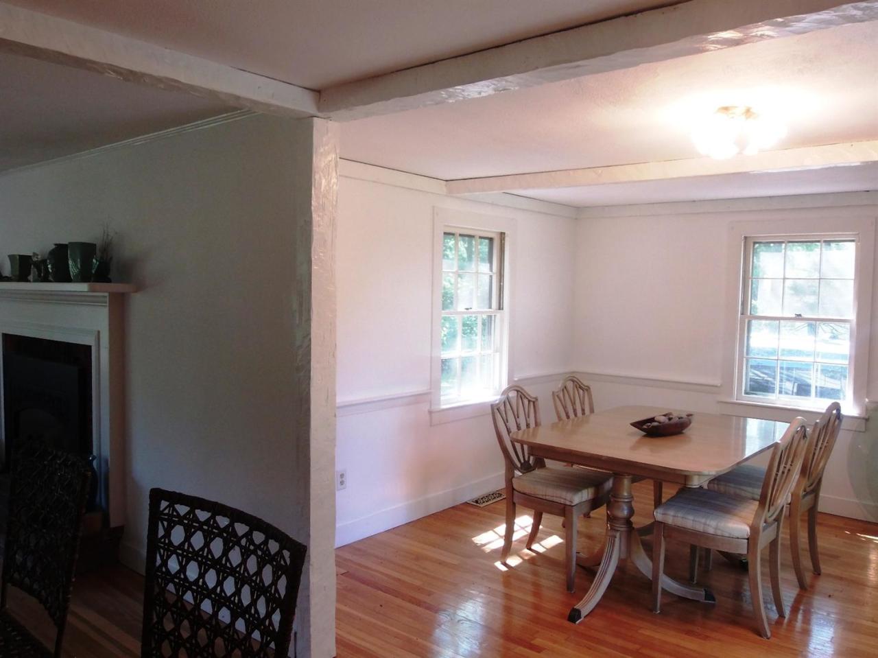 41 Edgewood Road Hyannis, MA 02601 - Photo 6 of 17 a view of a dining room with furniture and wooden floor