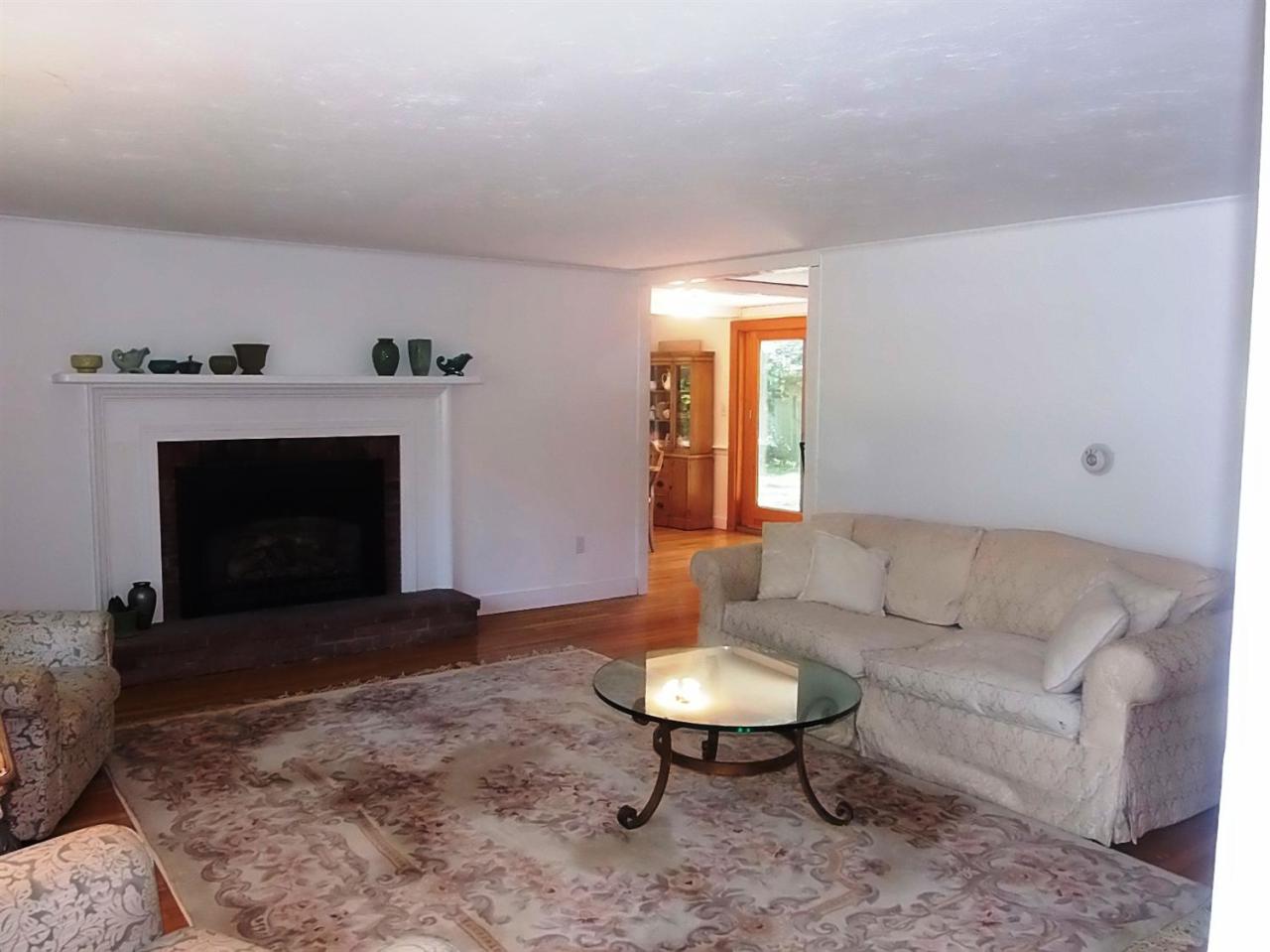 41 Edgewood Road Hyannis, MA 02601 - Photo 7 of 17 a living room with furniture and a fireplace