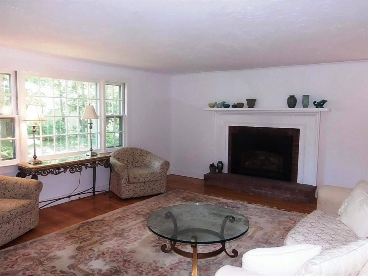 41 Edgewood Road Hyannis, MA 02601 - Photo 9 of 17 a living room with furniture and a fireplace