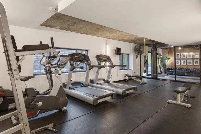 a view of a room with gym equipment