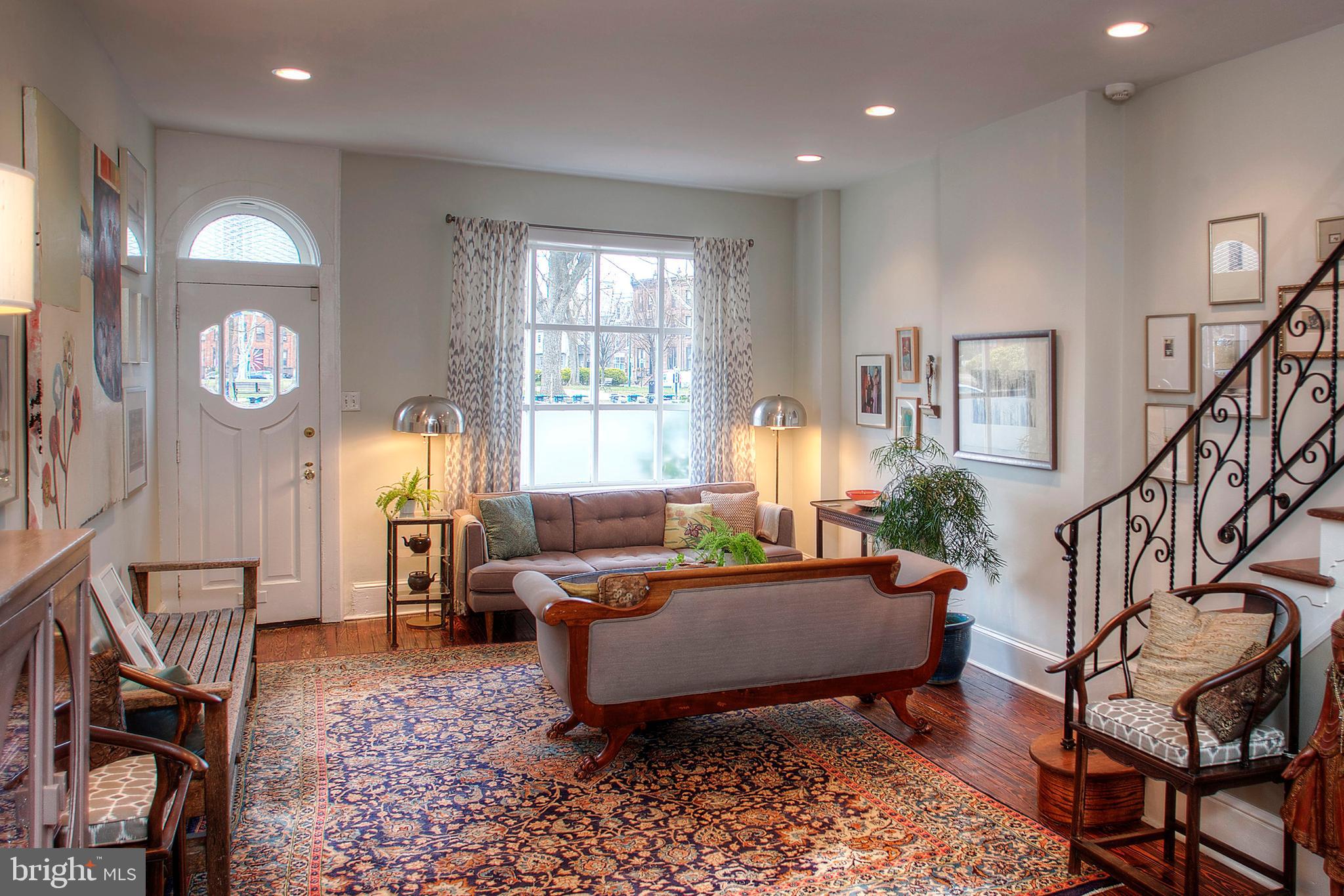 1615 East Moyamensing Avenue Philadelphia, PA 19148 - Photo 6 of 17 a living room with furniture and a window