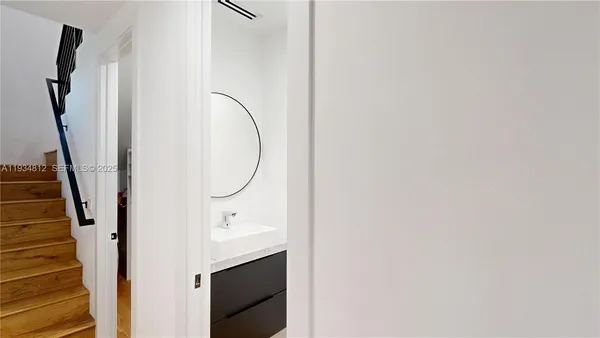 a view of entryway with wooden floor