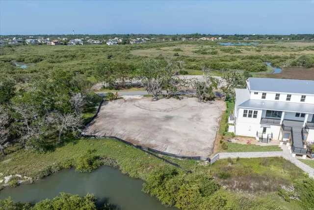 a view of an ocean and city
