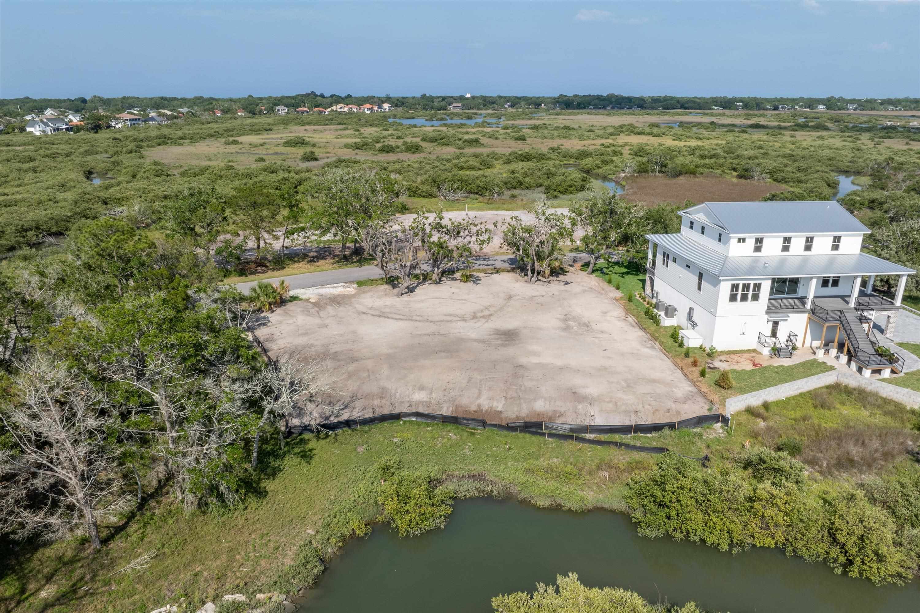 Reef Drive St. Augustine, FL 32080 - Photo 5 of 7 a view of an ocean with city