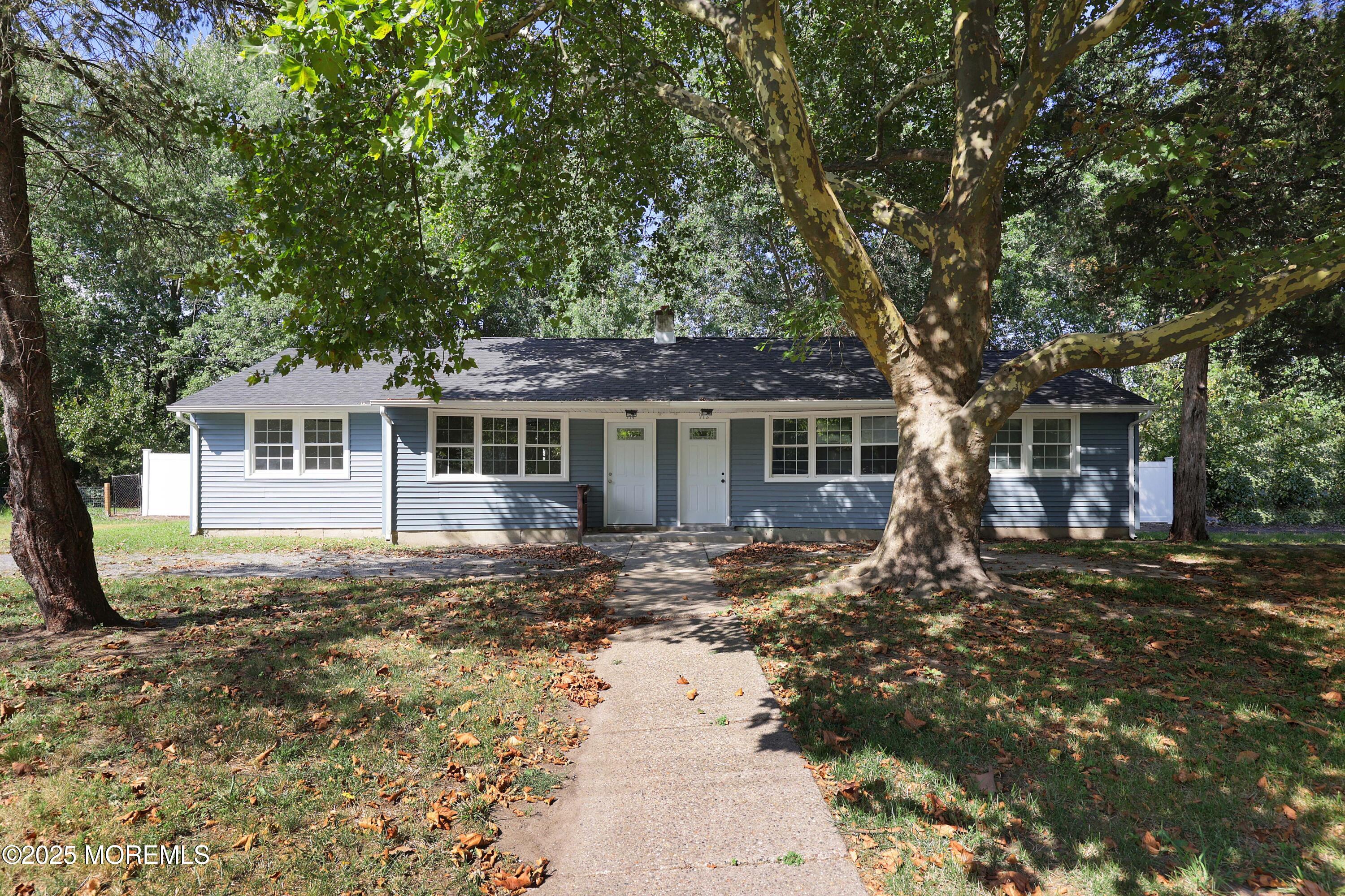 914 Pemberton Browns Mills Road Pemberton, NJ 08068 - Photo 17 of 28 a front view of a house with a yard