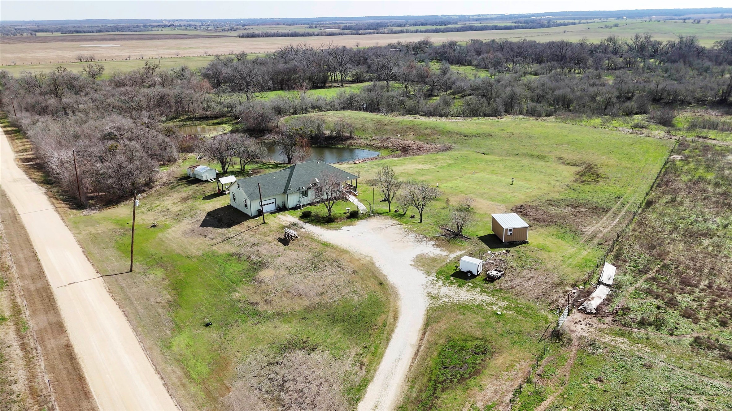471 County Road 471 Road Thrall, TX 76578 - Photo 16 of 20 a terrace with outdoor seating and trees