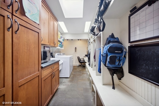 687 Birch Road Glencoe, IL 60022 - Photo 18 of 38 a kitchen with stainless steel appliances granite countertop a refrigerator and a stove