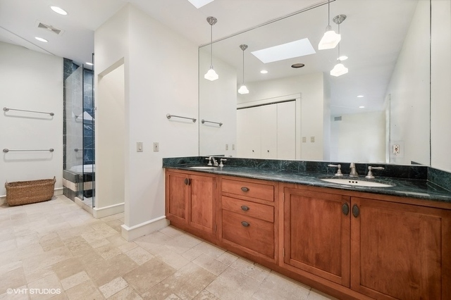 687 Birch Road Glencoe, IL 60022 - Photo 21 of 38 a bathroom with a granite countertop sink and a