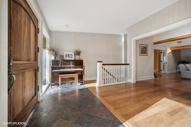 687 Birch Road Glencoe, IL 60022 - Photo 3 of 38 a bedroom with furniture and a window