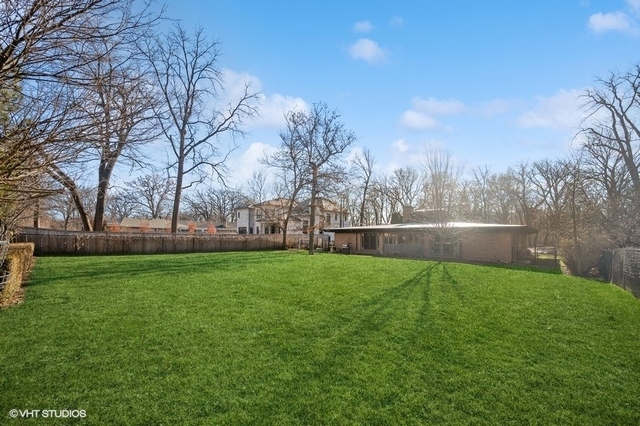 687 Birch Road Glencoe, IL 60022 - Photo 33 of 38 a view of a field of grass and trees