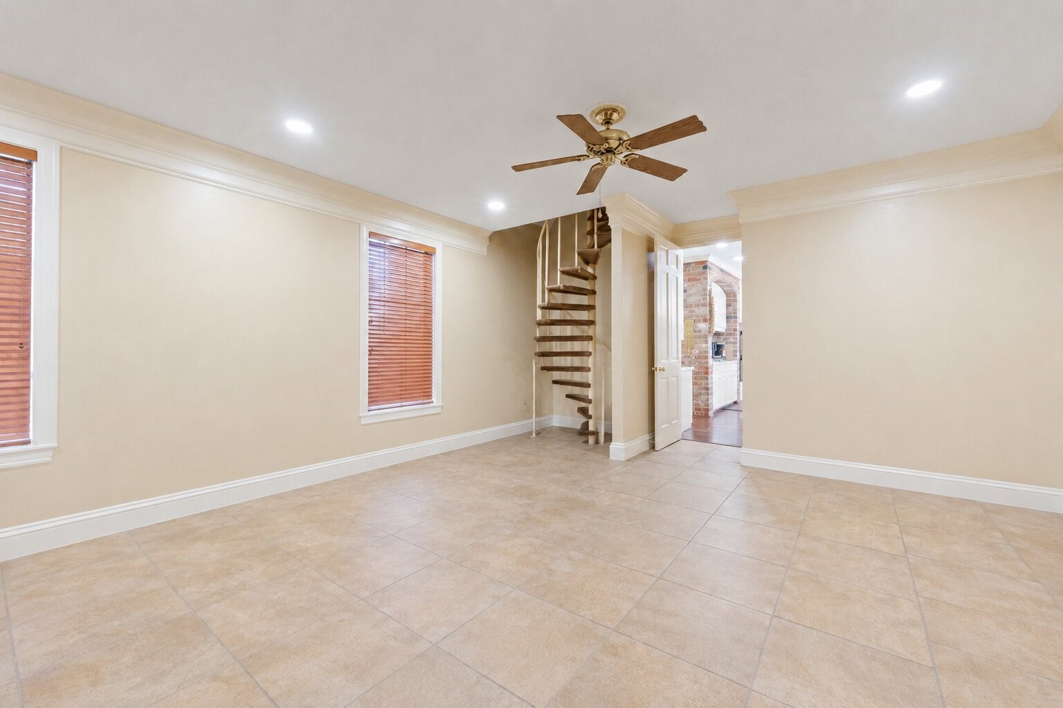 7639 Post Bridge Road Spring, TX 77389 - Photo 21 of 42 an empty room with windows and fan