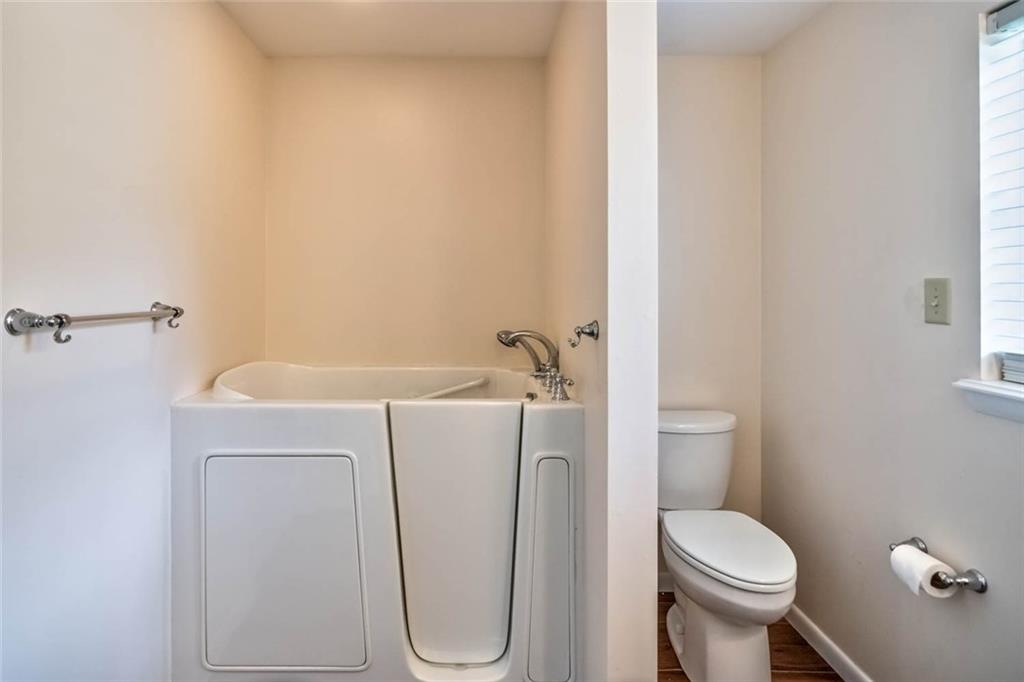 401 Ramsgate Drive Gibsonia, PA 15044 - Photo 11 of 25 First floor master bathroom with walk-in tub.