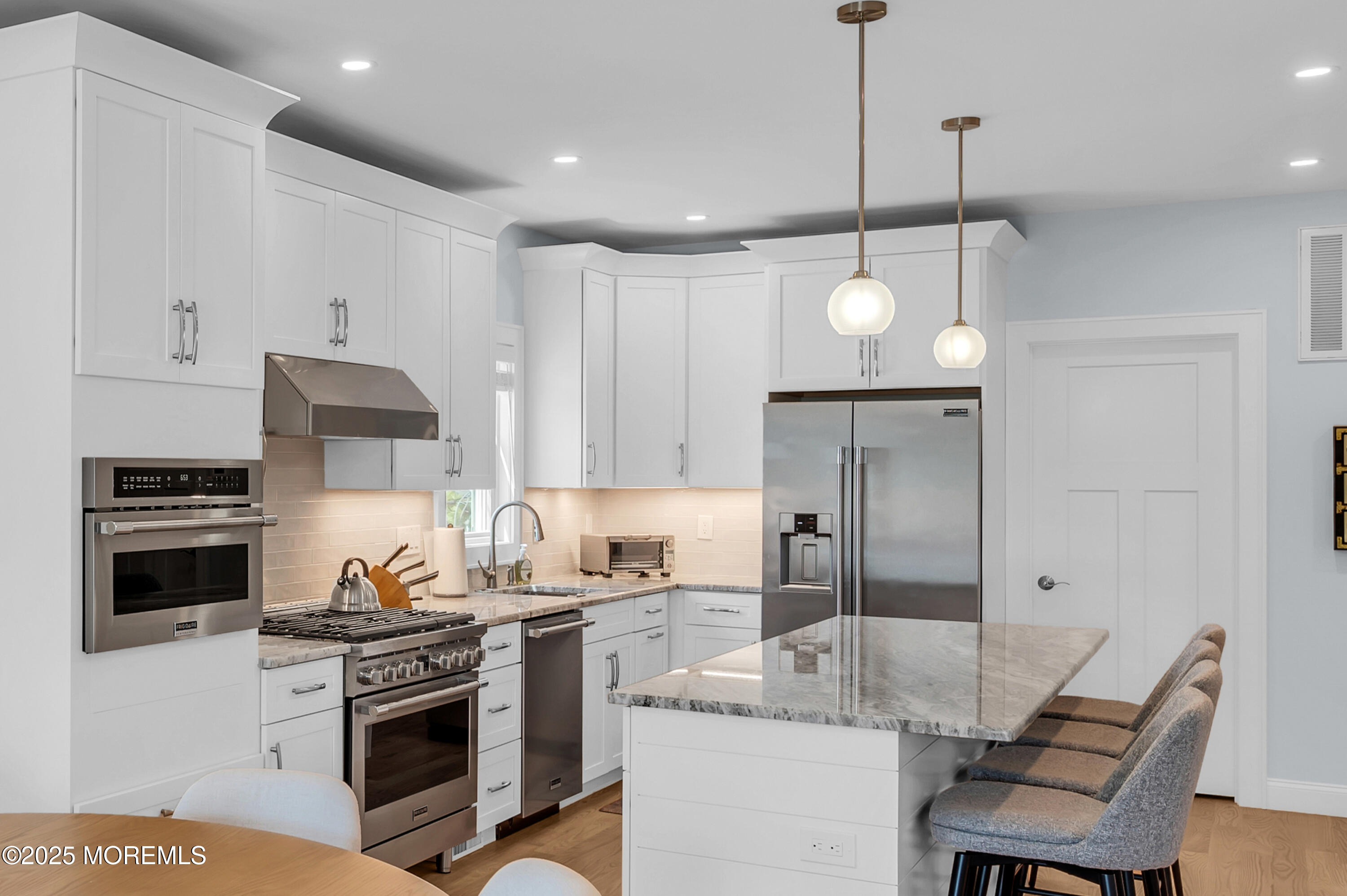 1503 Grand Central Avenue, Unit 2 Lavallette, NJ 08735 - Photo 13 of 47 a kitchen with a sink stove and refrigerator