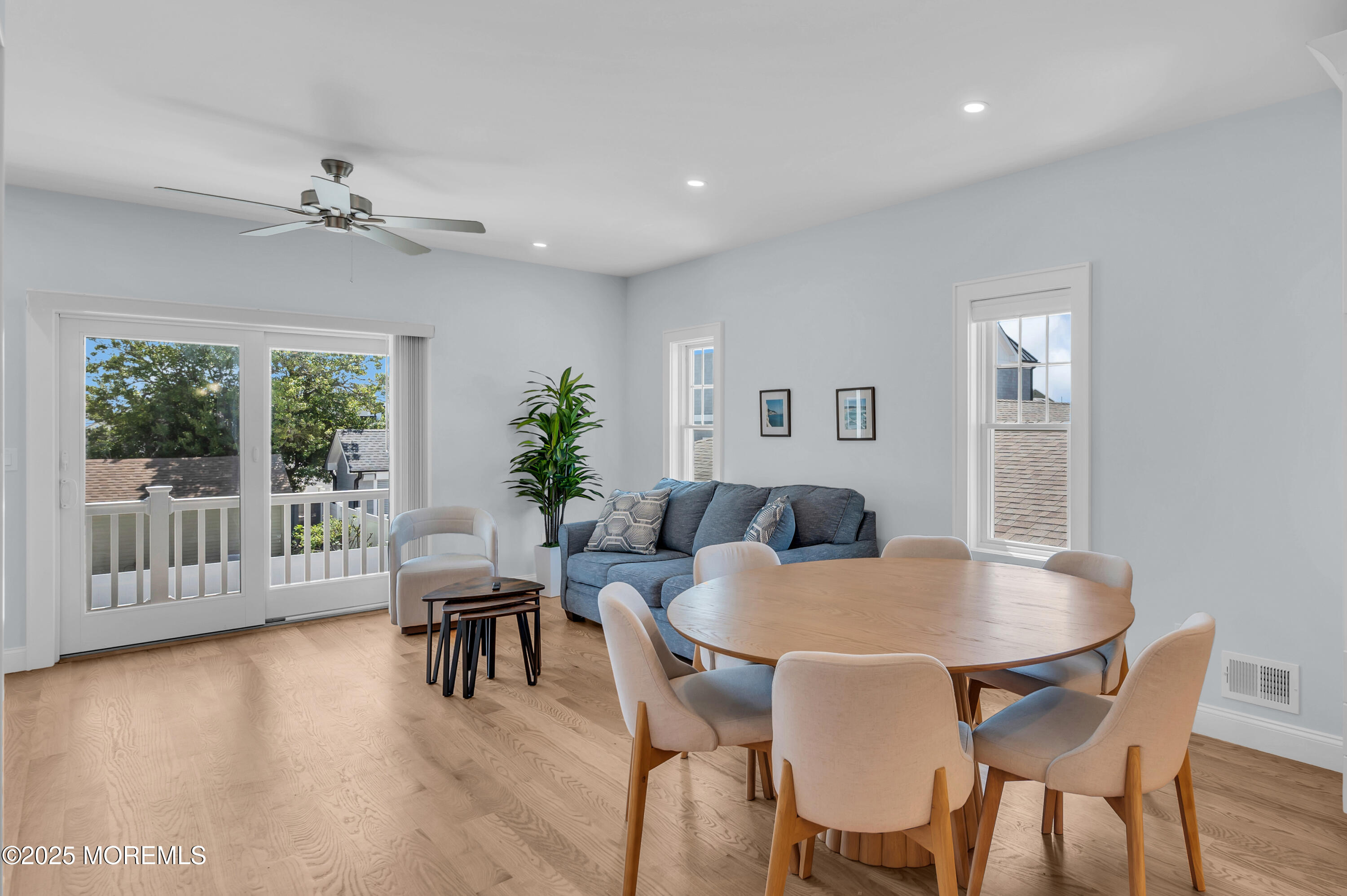 1503 Grand Central Avenue, Unit 2 Lavallette, NJ 08735 - Photo 15 of 47 a dining room with furniture window and wooden floor
