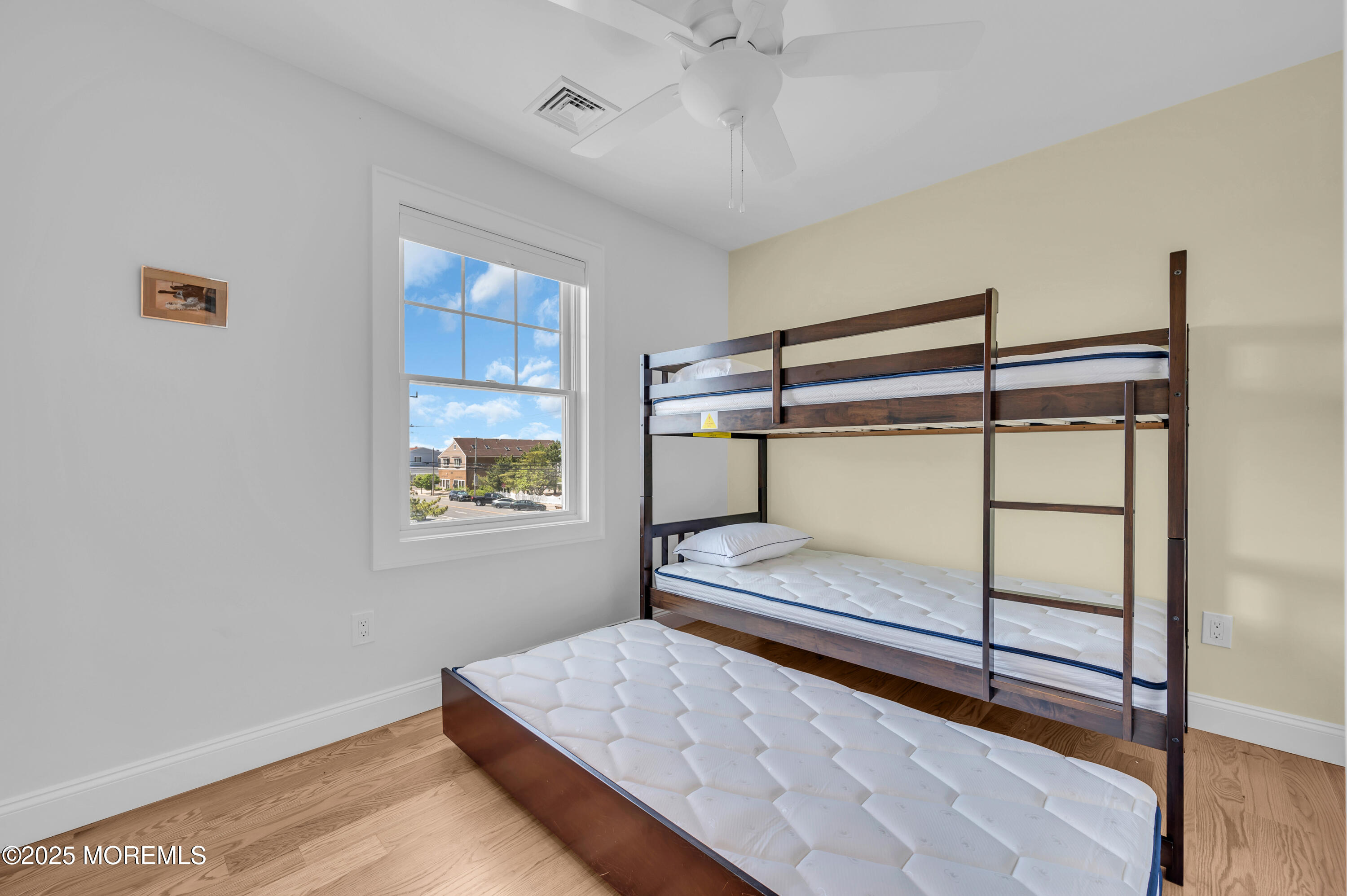 1503 Grand Central Avenue, Unit 2 Lavallette, NJ 08735 - Photo 33 of 47 a bedroom with a bed and a window