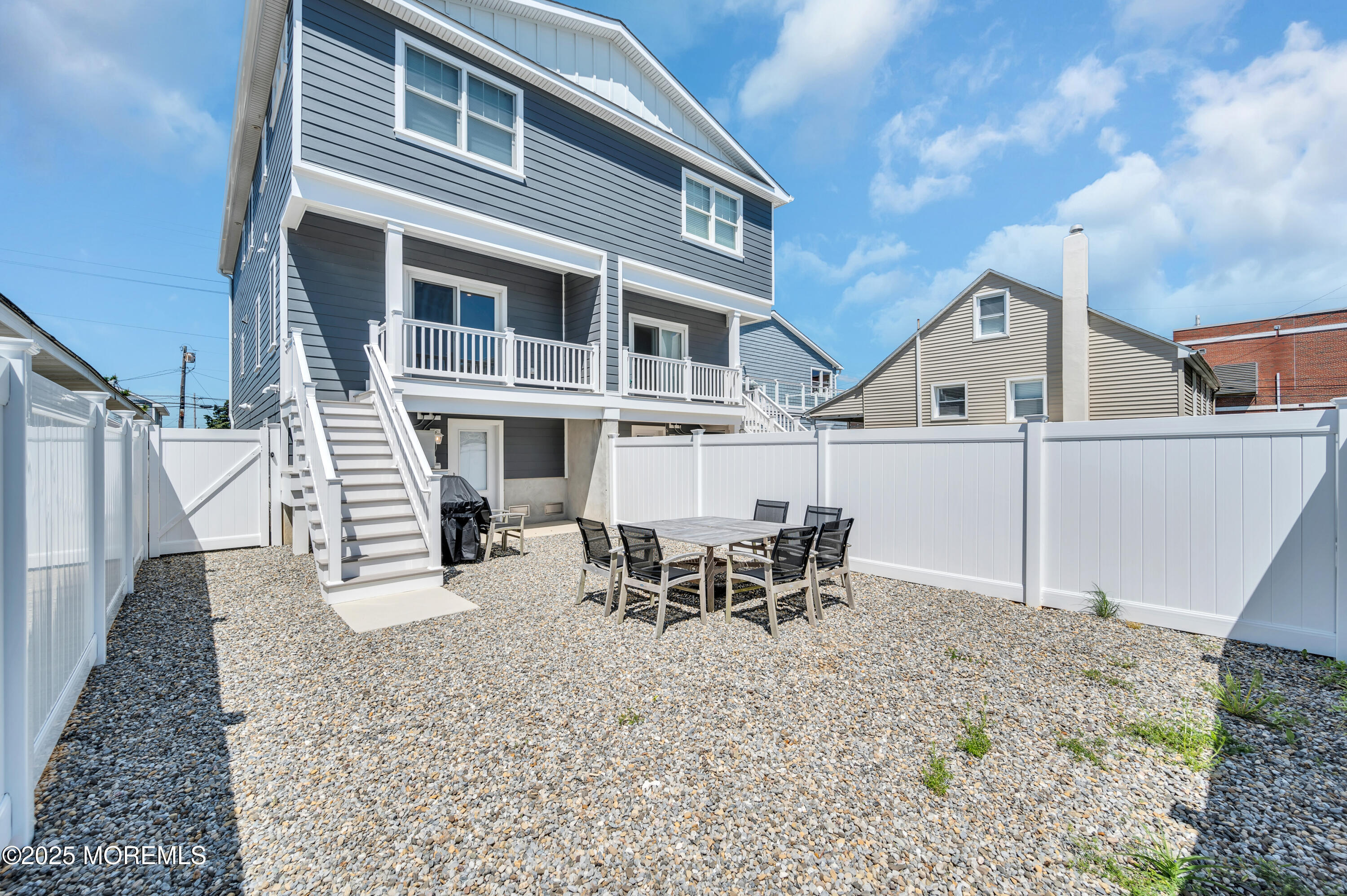 1503 Grand Central Avenue, Unit 2 Lavallette, NJ 08735 - Photo 8 of 47 a view of a house with a yard and sitting area