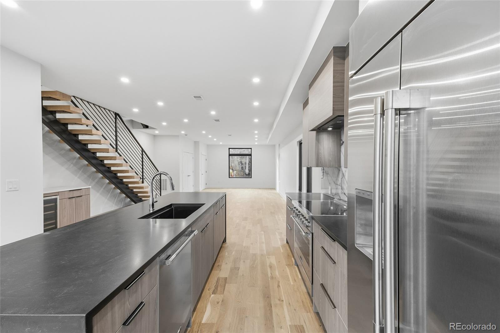 1448 Stuart Street Denver, CO 80204 - Photo 7 of 27 a view of hallway with stairs