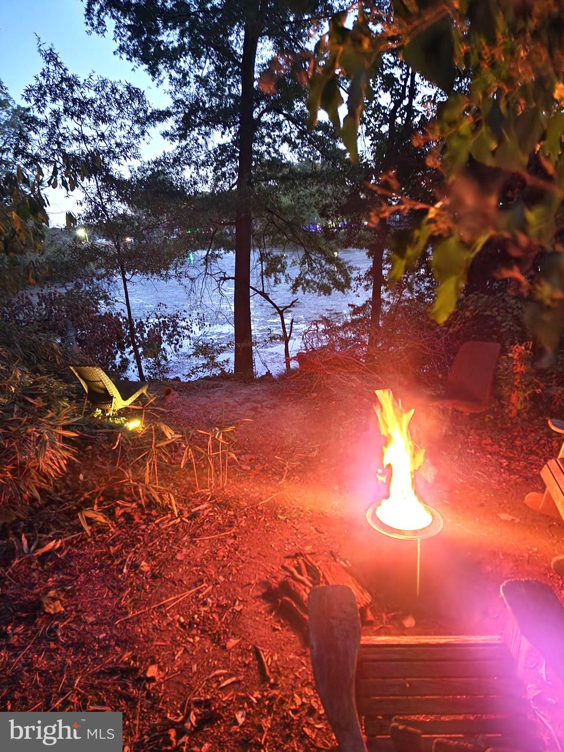 2217 Middleborough Road Essex, MD 21221 - Photo 4 of 6 a view of a backyard of a house with table and chairs