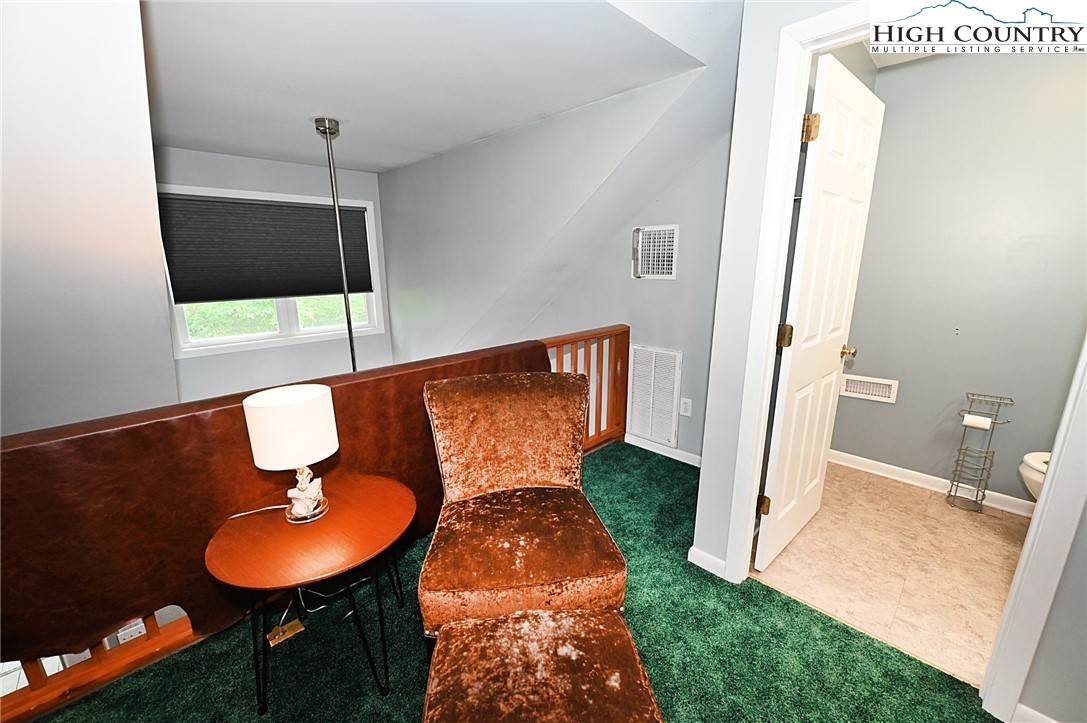 3430-3390 Rose Creek Road Morganton, NC 28655 - Photo 17 of 50 a front view of a house with a yard