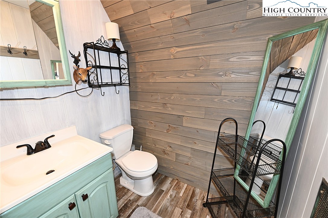 3430-3390 Rose Creek Road Morganton, NC 28655 - Photo 34 of 50 a bathroom with a toilet sink and shower