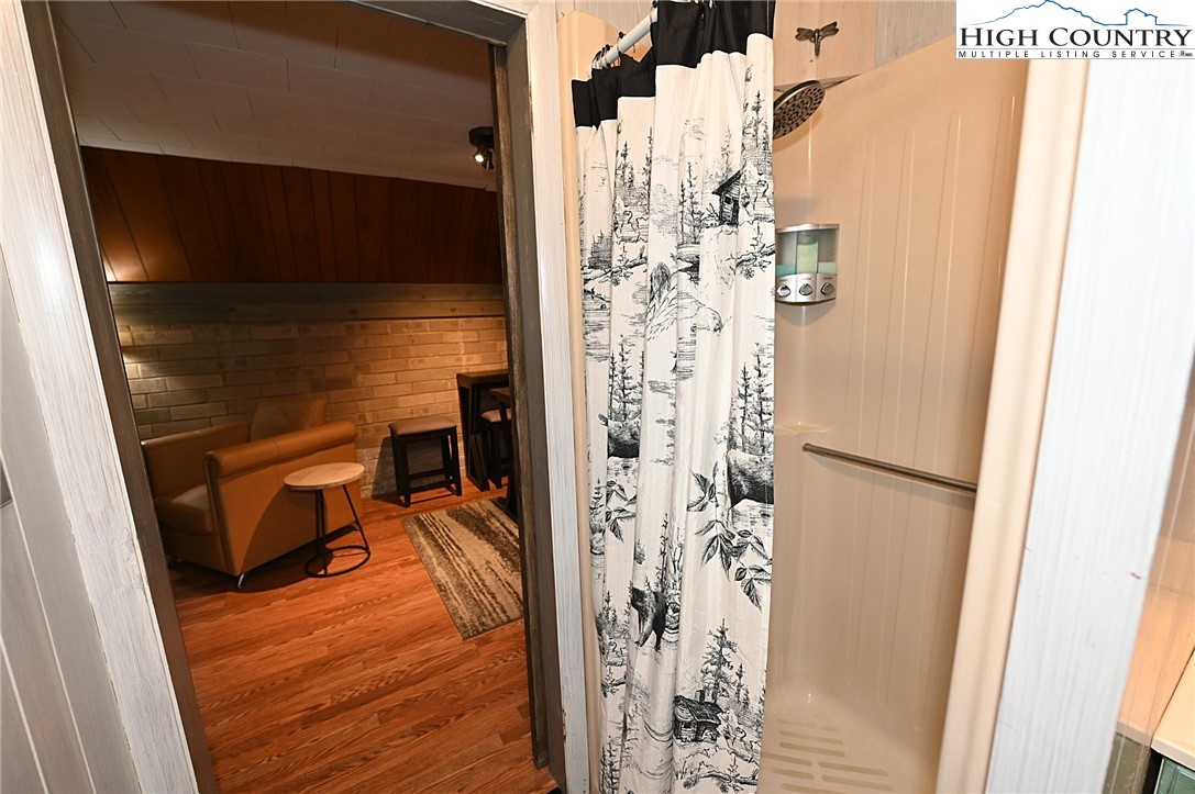 3430-3390 Rose Creek Road Morganton, NC 28655 - Photo 36 of 50 a view of walk in closet with clothes