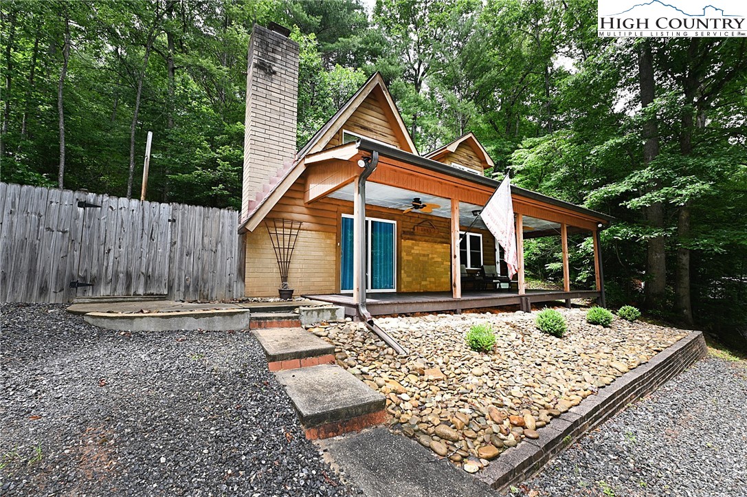 3430-3390 Rose Creek Road Morganton, NC 28655 - Photo 40 of 50 a front view of a house with garden