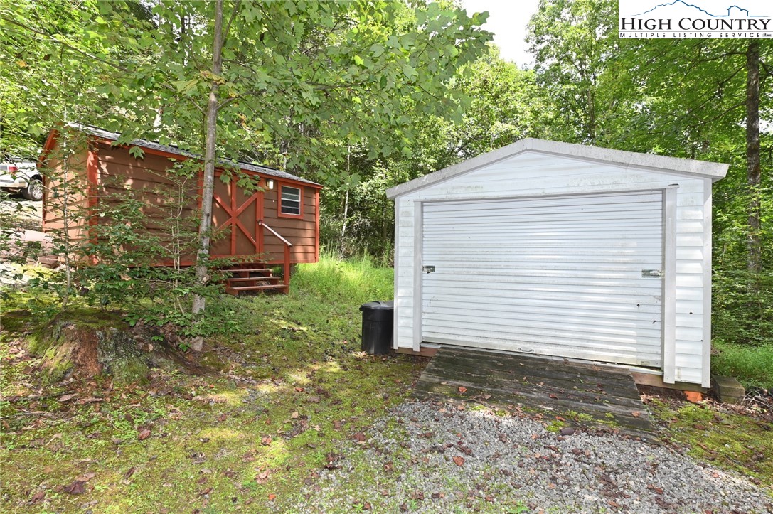 3430-3390 Rose Creek Road Morganton, NC 28655 - Photo 50 of 50 a backyard of a house