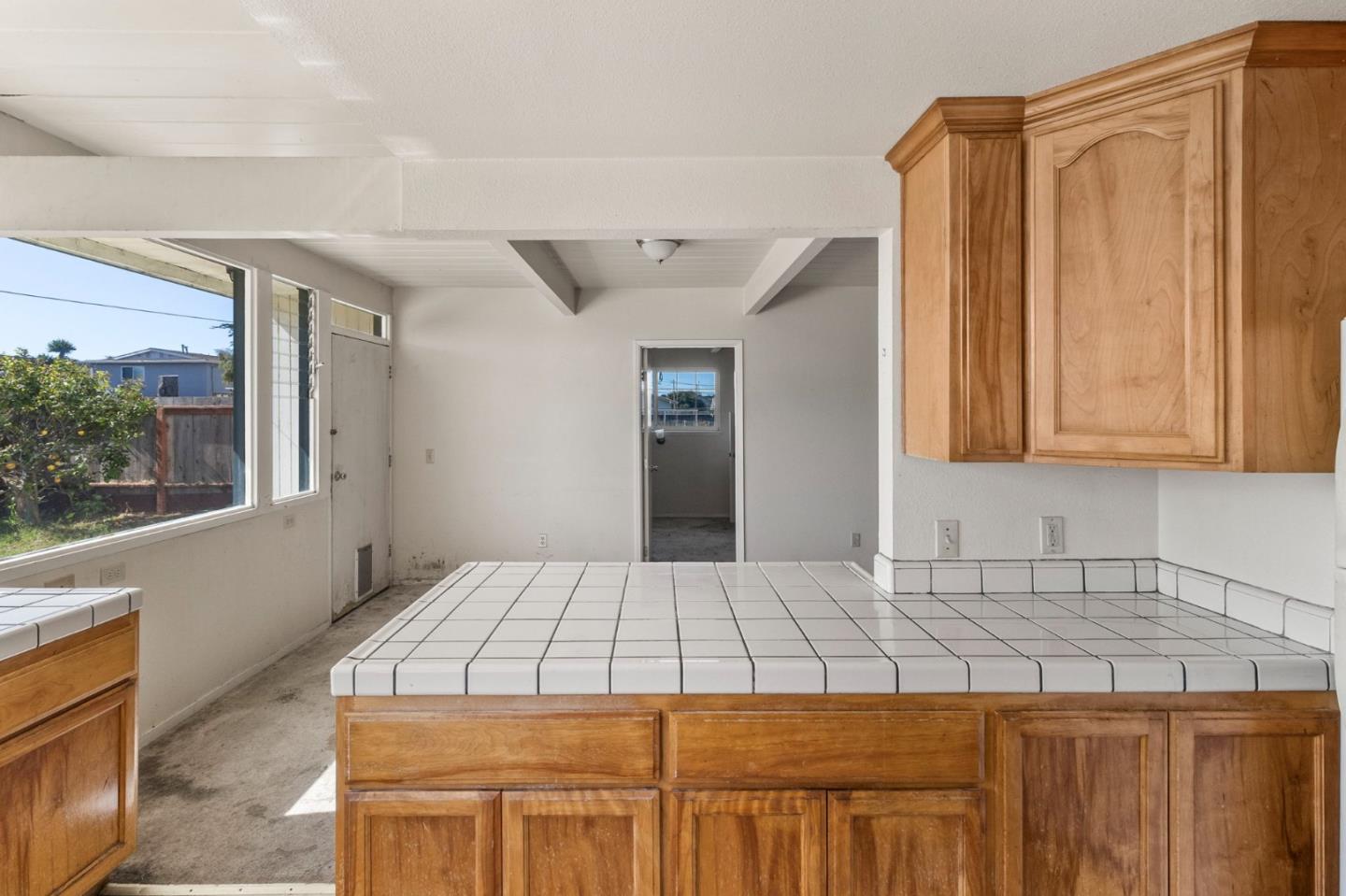 220 Mortimer Lane Marina, CA 93933 - Photo 15 of 42 a bedroom with a bed and a window