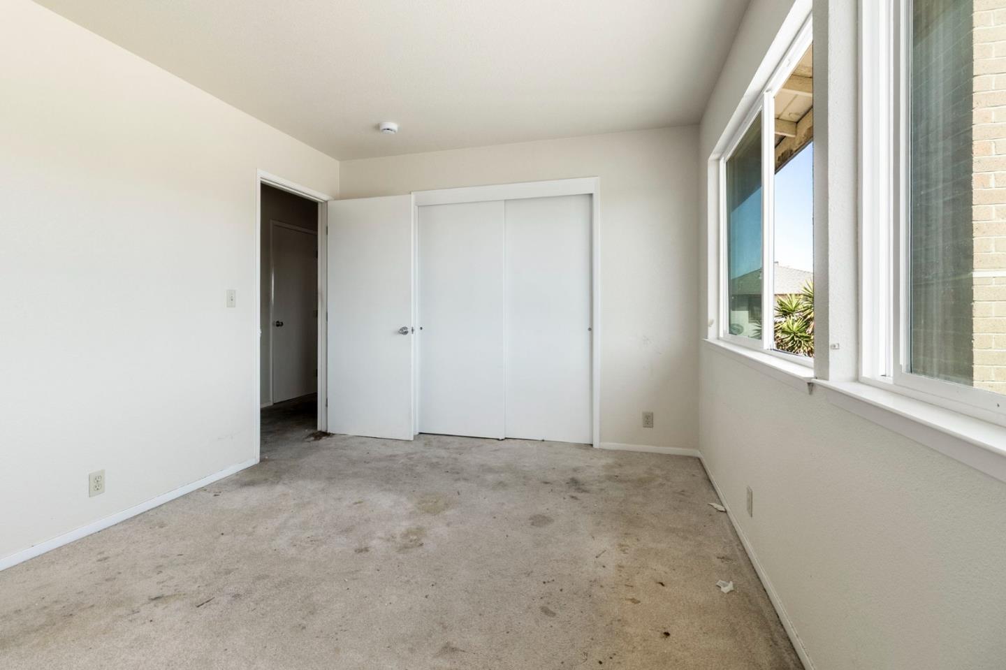 220 Mortimer Lane Marina, CA 93933 - Photo 27 of 42 an empty room with windows