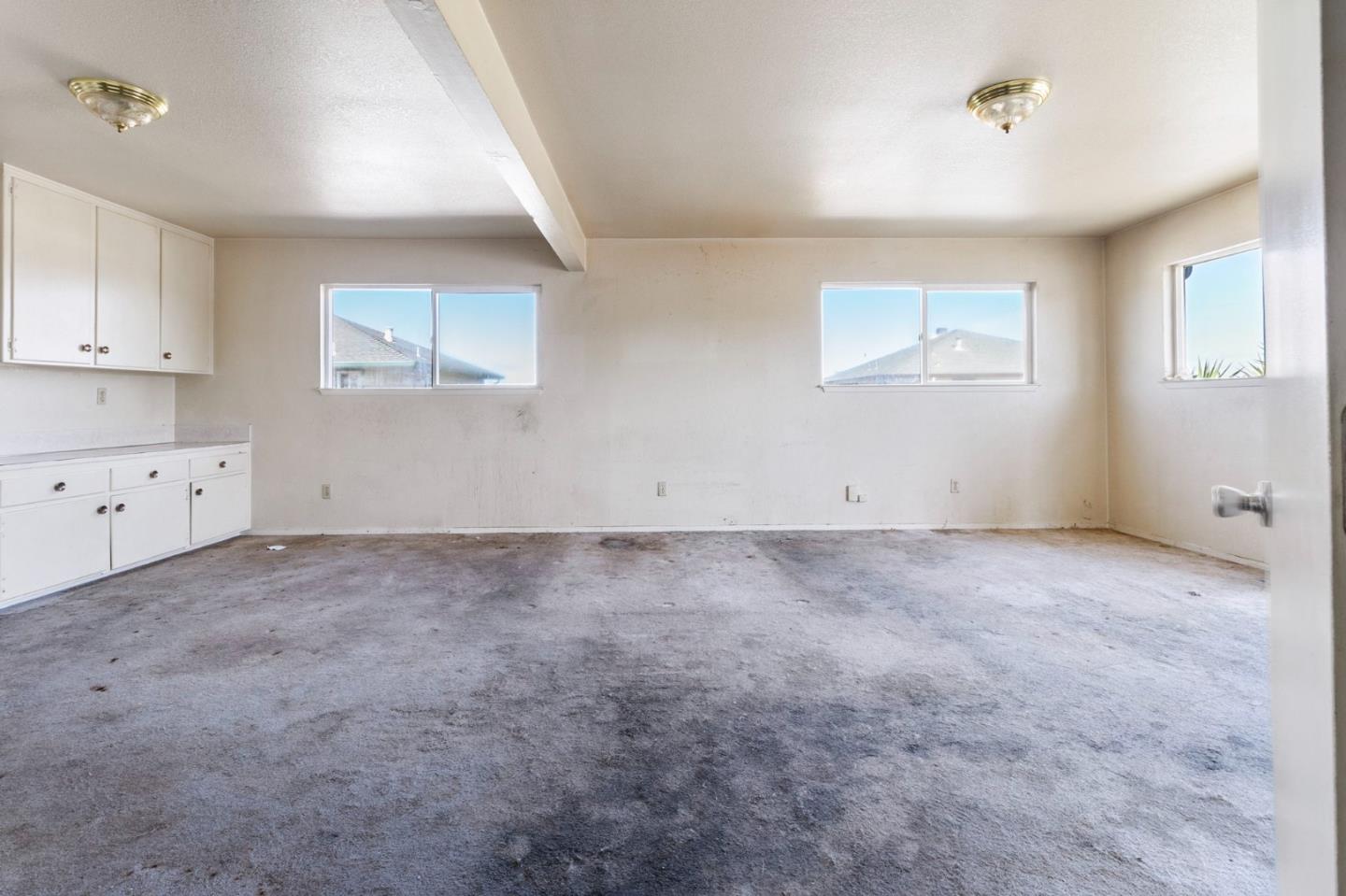 220 Mortimer Lane Marina, CA 93933 - Photo 32 of 42 a view of a livingroom with an empty space