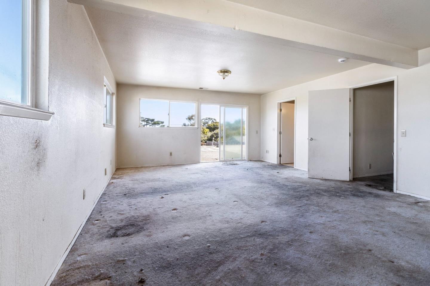 220 Mortimer Lane Marina, CA 93933 - Photo 34 of 42 an empty room with closet and mirror