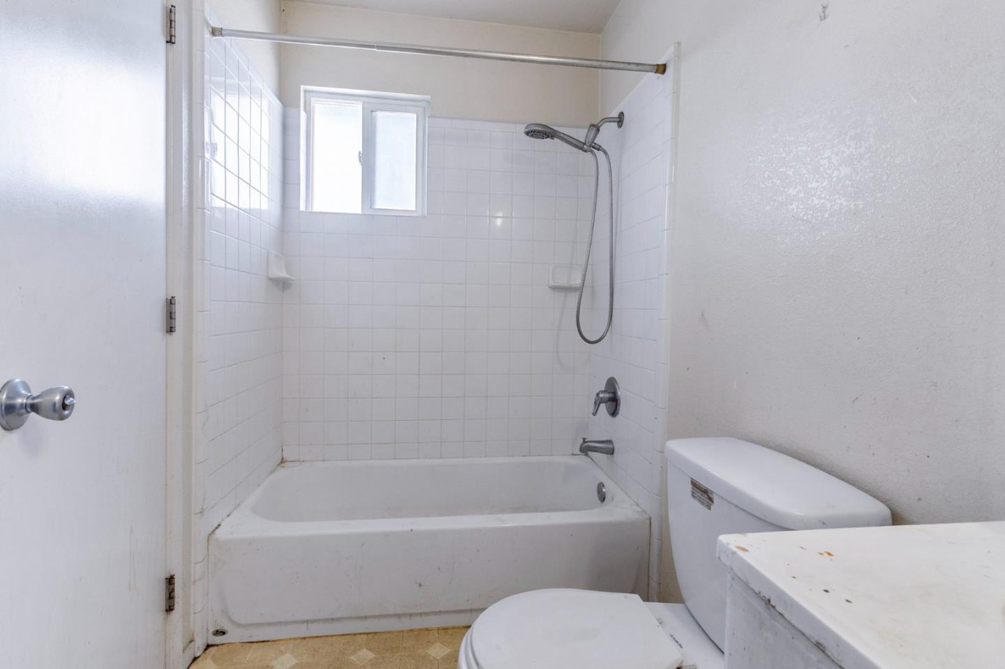 220 Mortimer Lane Marina, CA 93933 - Photo 37 of 42 a bathroom with a toilet and a bath tub