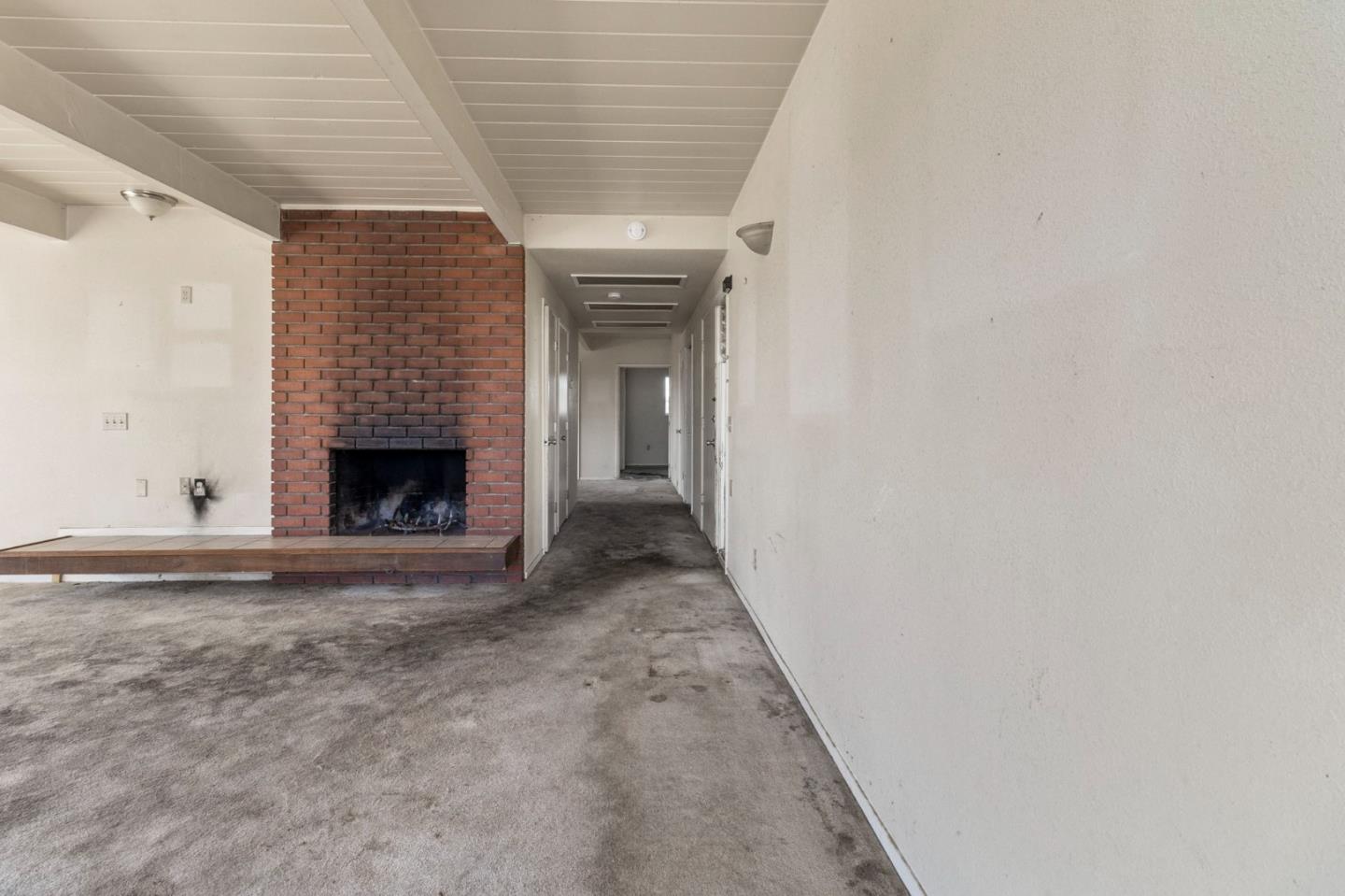 220 Mortimer Lane Marina, CA 93933 - Photo 9 of 42 a view of empty room with wooden floor