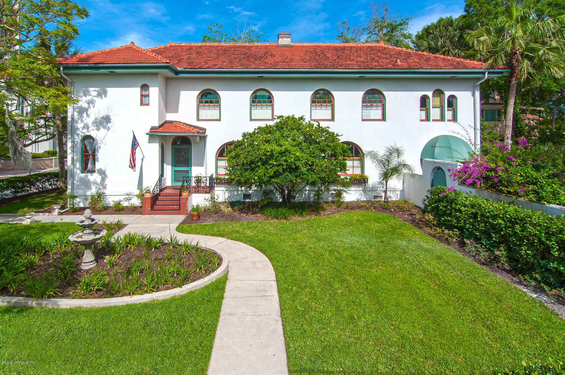 39 Valencia Street St. Augustine, FL 32084 - Photo 1 of 58 a front view of a house with garden