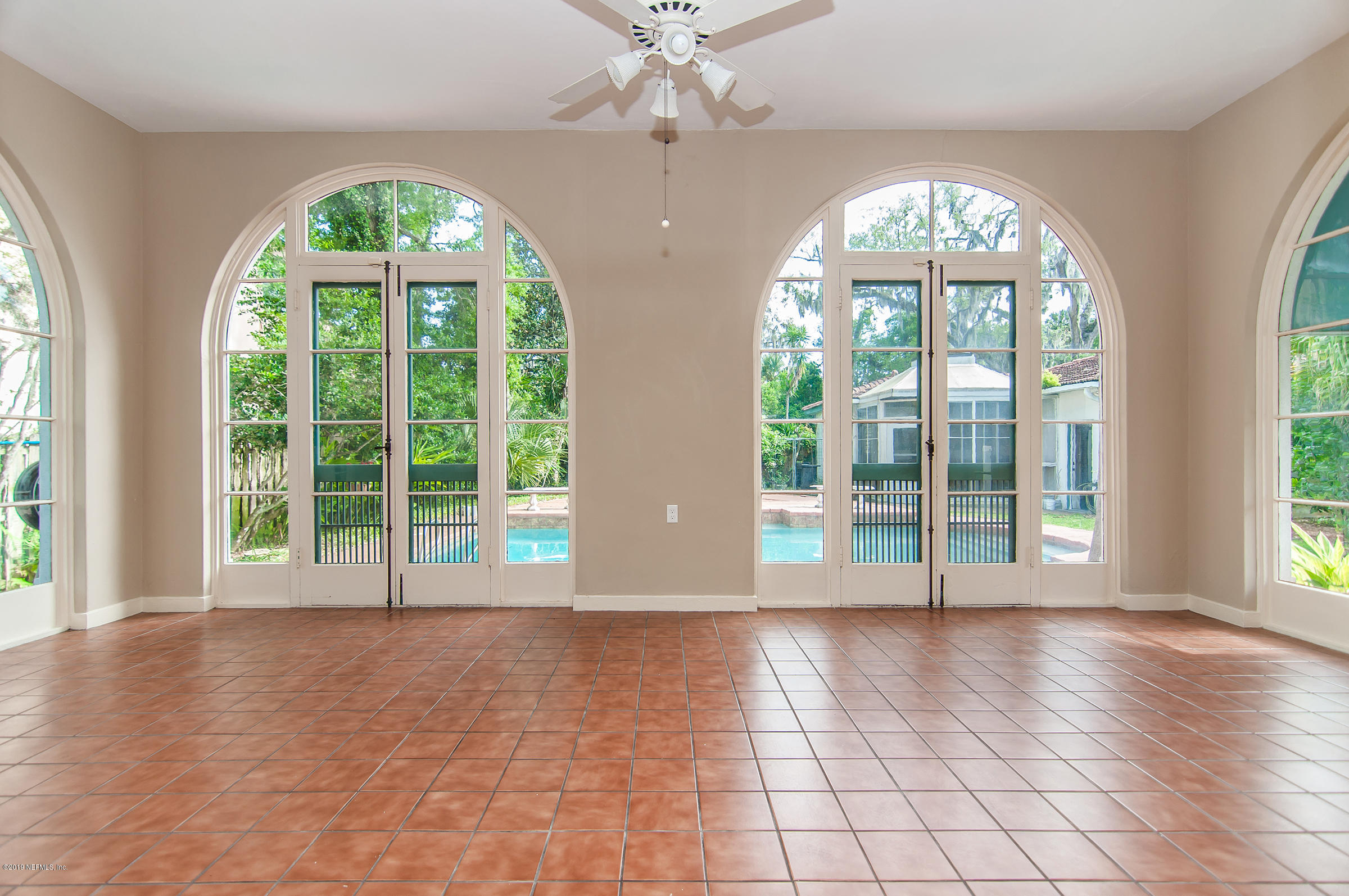 39 Valencia Street St. Augustine, FL 32084 - Photo 11 of 58 a view of an entryway with a floor to ceiling window
