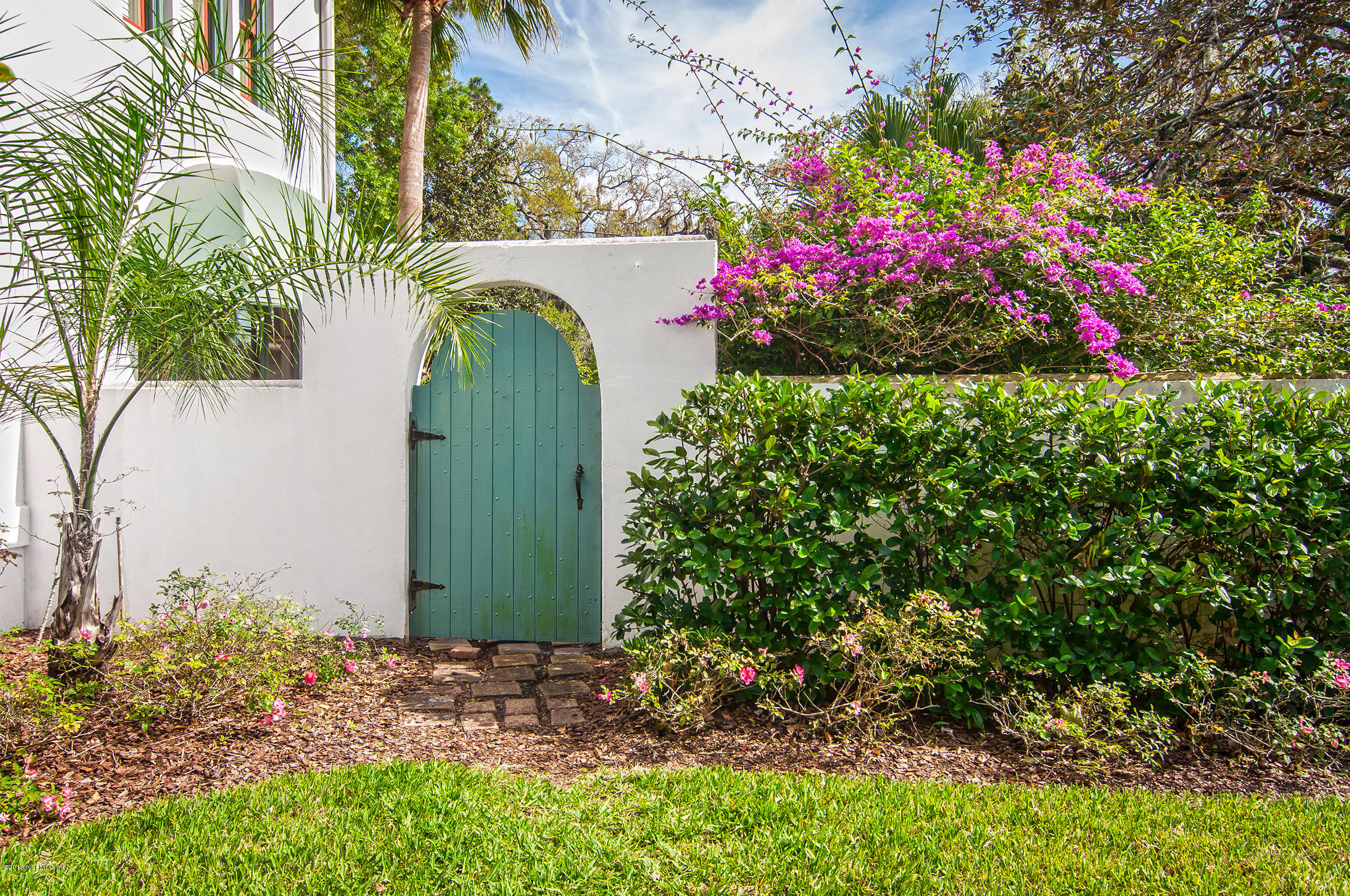 39 Valencia Street St. Augustine, FL 32084 - Photo 47 of 58 a view of a garden with flowers