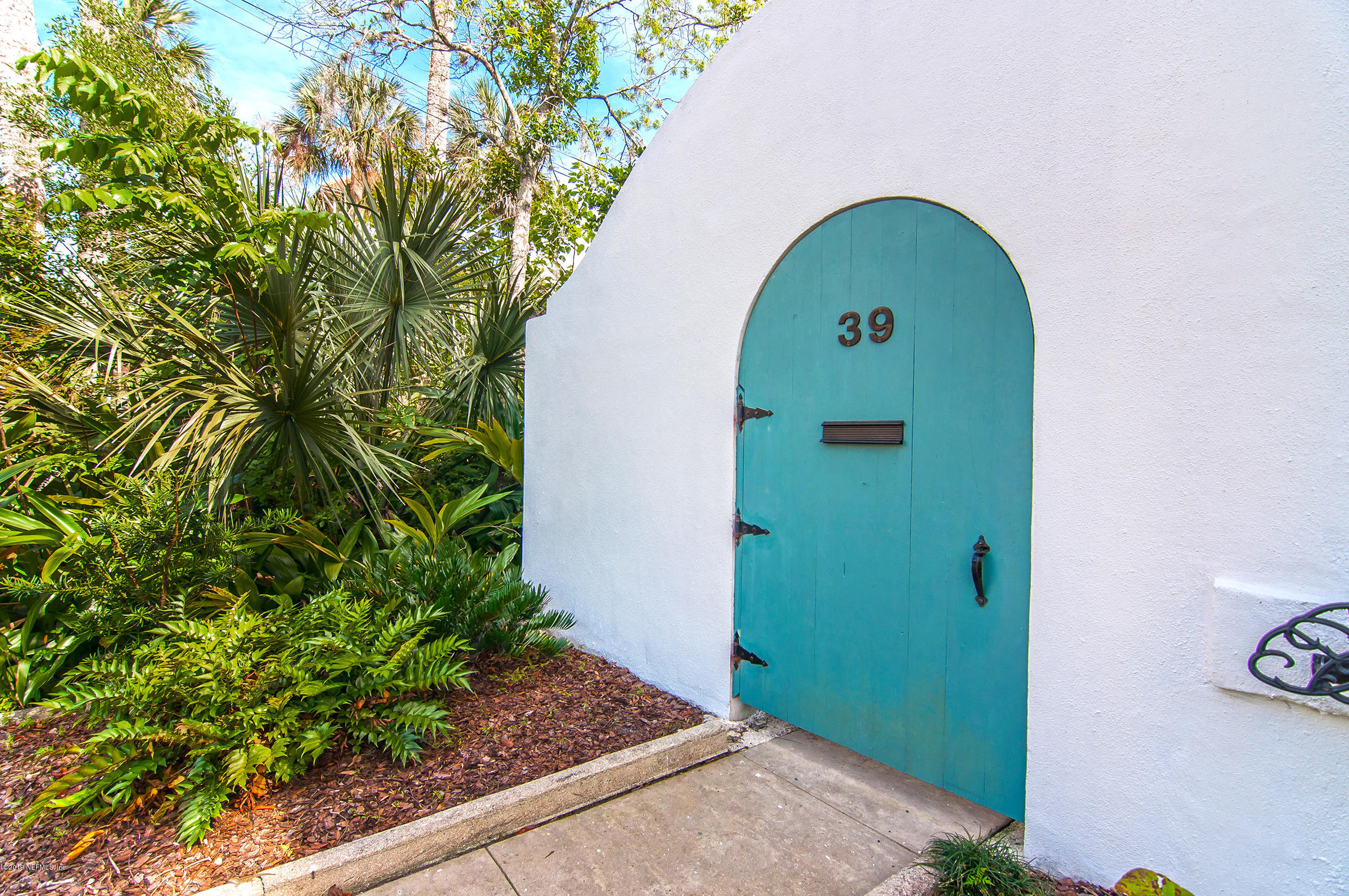 39 Valencia Street St. Augustine, FL 32084 - Photo 50 of 58 a view of a small garden