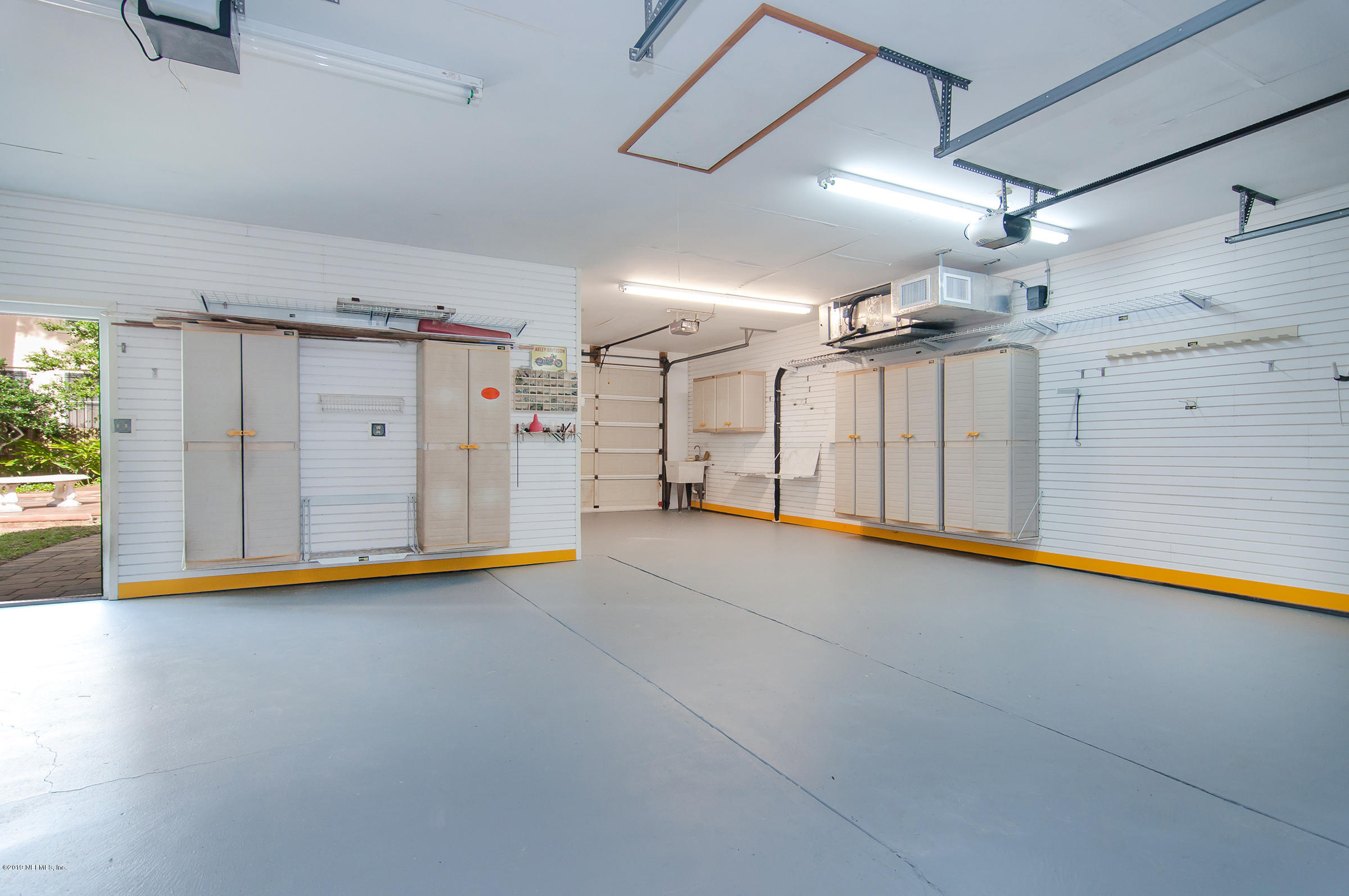 39 Valencia Street St. Augustine, FL 32084 - Photo 54 of 58 a view of a garage with furniture