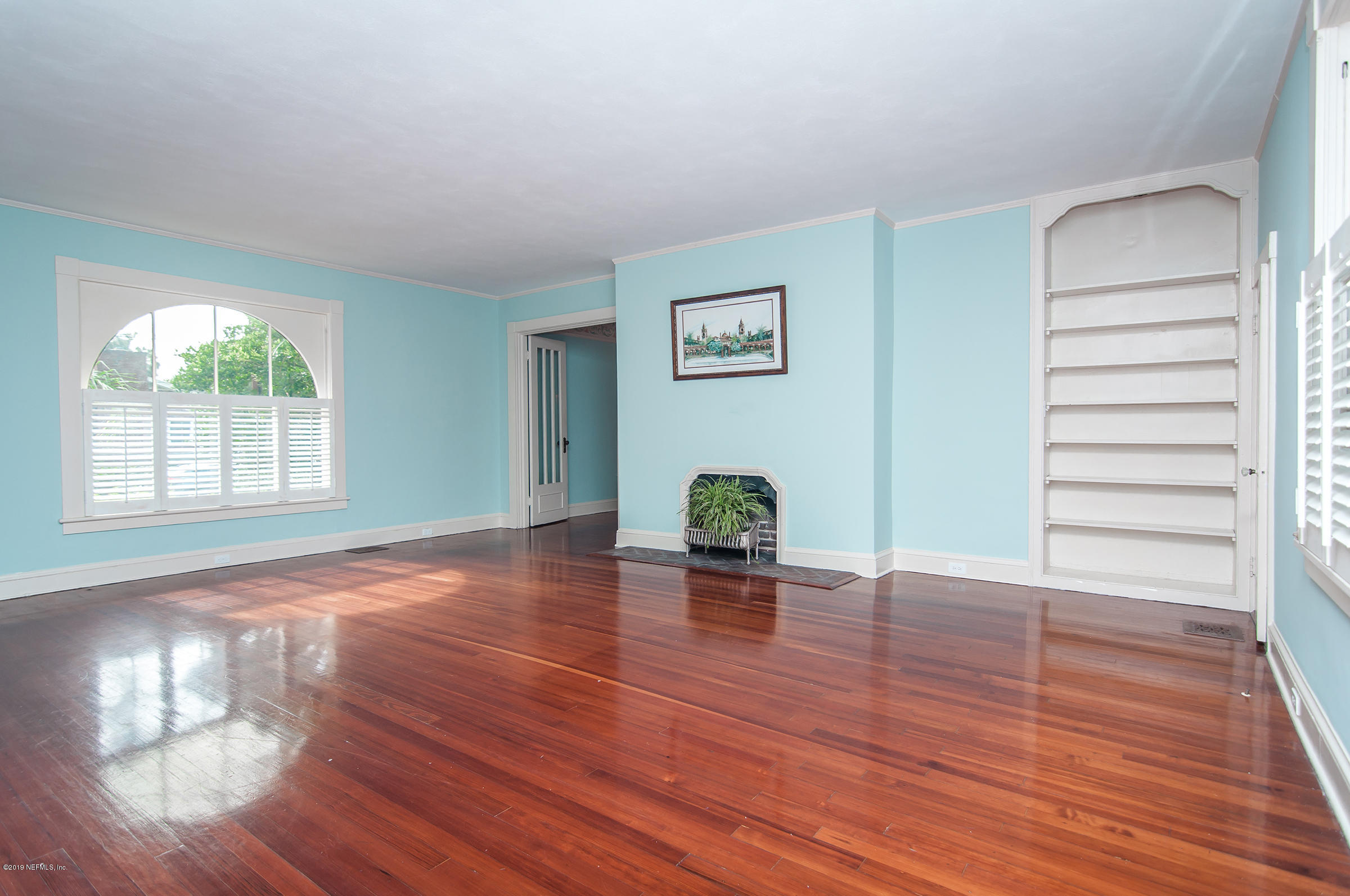 39 Valencia Street St. Augustine, FL 32084 - Photo 10 of 58 a view of empty room with wooden floor and fan
