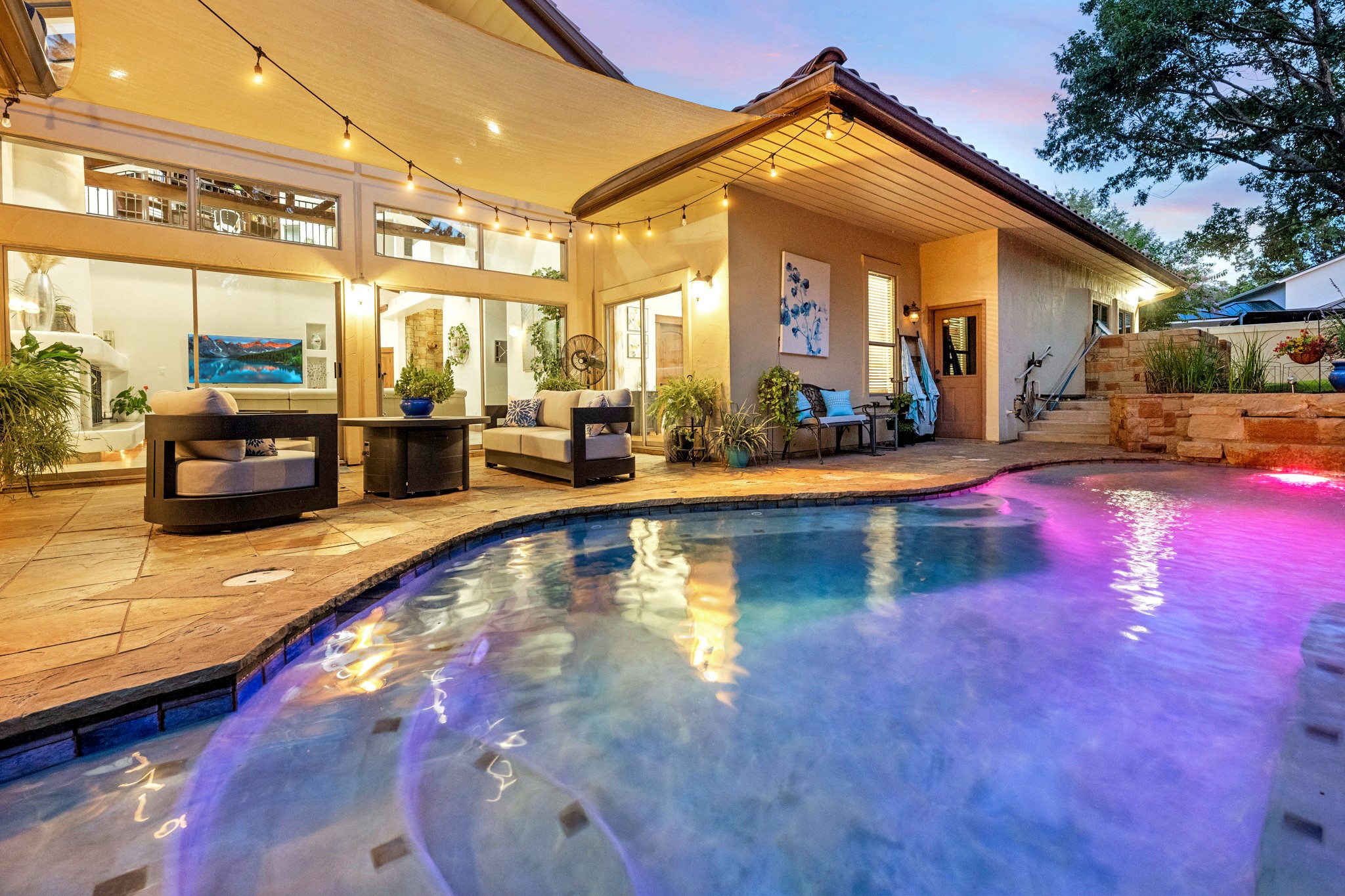 407 Hurst Creek Road Lakeway, TX 78734 - Photo 1 of 40 Outdoor covered living that overlooks a SPARKLING POOL!
