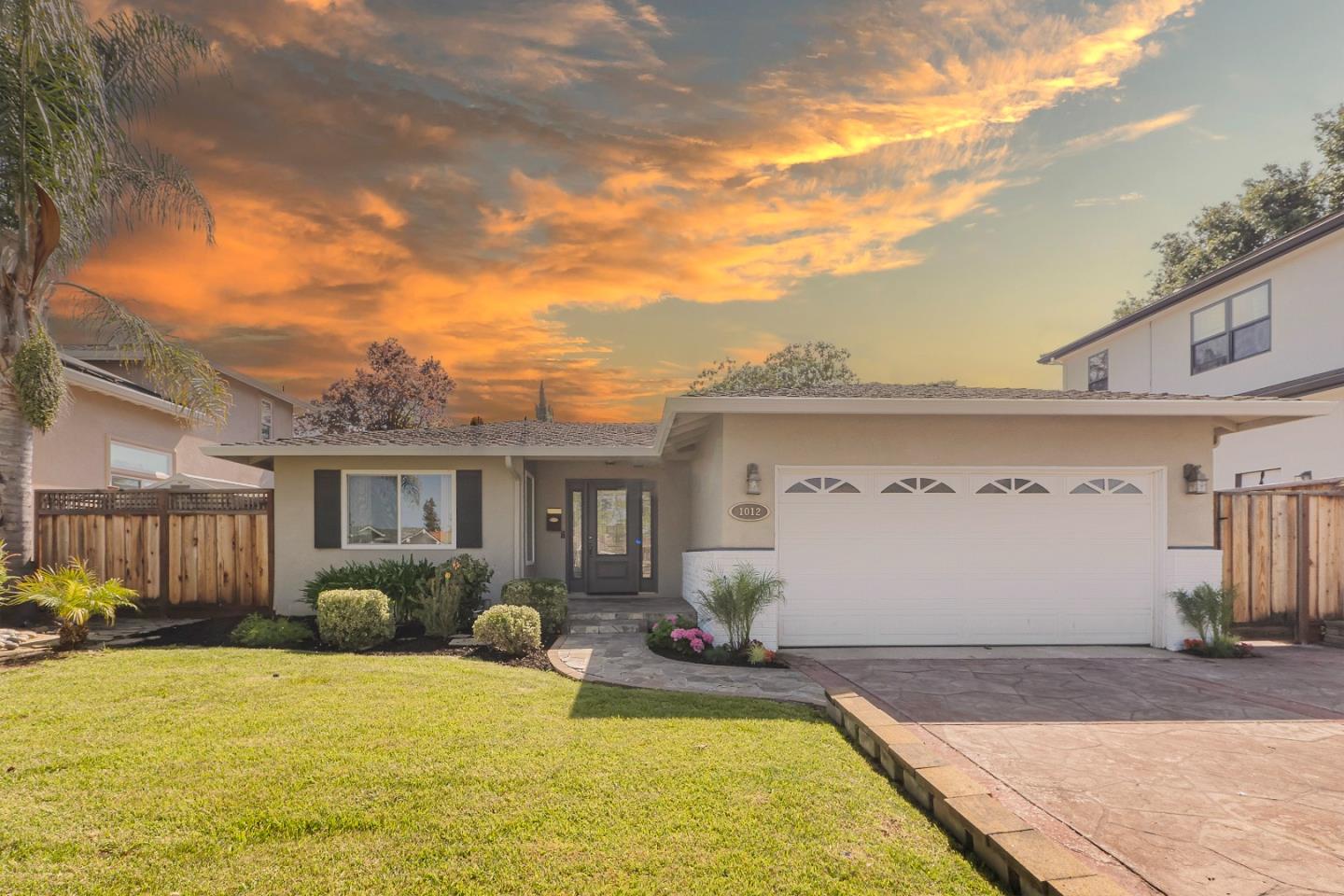 a view of a house with swimming pool
